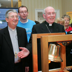 Dublin Archbishop Diarmuid Martin, left, stands with Cardinal Sean Brady as they announce plans for the 50th International Eucharistic Congress in Dublin. The congress will take place June 10-17 next year.