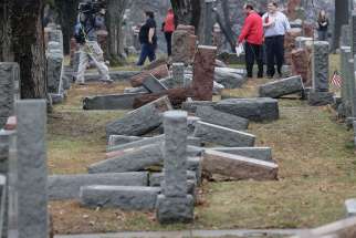 Local and national media report on more than 170 toppled Jewish headstones Feb. 21 after a vandalism attack on Chesed Shel Emeth Cemetery in University City, Mo. The incident at the cemetery near St. Louis was repeated in suburban Philadelphia Feb. 26 when gravestones were destroyed at a Jewish cemetery there.