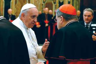 American Cardinal Raymond Burke, here shaking hands with Pope Francis, is one of four senior Churchmen demanding clarification on points of doctrine in Amoris Laetitia.