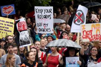 Demonstrators take part in a protest on Sept. 24, 2016, in Dublin to urge the Irish government to repeal the eighth amendment to the constitution, which enforces strict limitations to a woman&#039;s right to an abortion. 