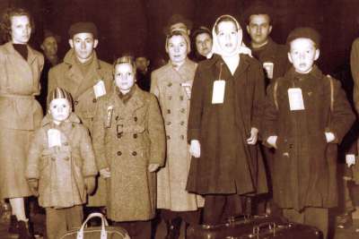 Hungarian refugees arrive in Canada in 1957, fleeing from Communist rule in their homeland. 