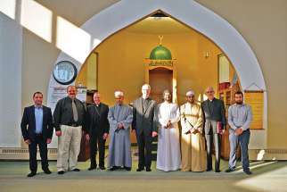 Leaders from the Archdiocese of Edmonton, including Archbishop Richard Smith (centre), Auxiliary Bishop Greg Bittman and Chancellor Adam Lech, were welcomed by their Muslim counterparts. 