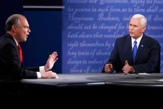 U.S. Sen. Tim Kaine of Virginia, the Democratic nominee for vice president, and Indiana Gov. Mike Pence, the Republican nominee, speak during their vice presidential debate Oct. 4 at Longwood University in Farmville, Va.