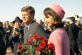 U.S. President John F. Kennedy and first lady, Jacqueline Kennedy, arrive at Love Field in Dallas Nov. 22, 1963. 