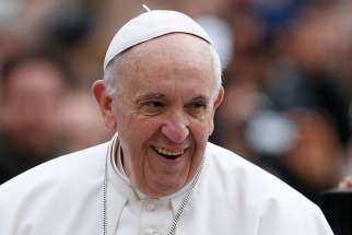 Pope Francis smiles during his general audience in St. Peter&#039;s Square at the Vatican March 22.
