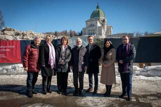 St. Joseph Oratory in Montreal, Canada, is about to get a $110 million makeover under a plan to make the popular site more attractive to tourists. Canadians involved in the project are pictured near the oratory. 
