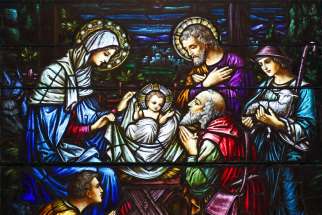 This stained-glass window at St. Aloysius Church in Great Neck, N.Y., depicts Jesus in a manger surrounded by Mary, Joseph and three shepherds. Jesus spent his entire life with those on the margins, so it was no accident that a group of sheep watchers got the first peek at God&#039;s arrival.