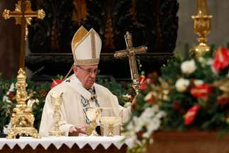 Pope Francis arrives the altar during a Mass marking the feast of the Epiphany in St. Peter&#039;s Basilica at the Vatican Jan. 6.