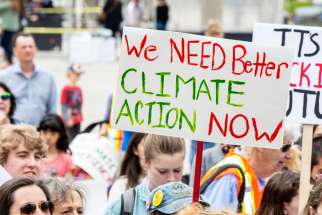 Signs at the Climate Strike in Nathan Phillips Square asked for immediate action.
