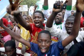 Supporters of presidential candidate Muhammadu Buhari and his All Progressives Congress (APC) party celebrate in Kano on Tuesday (March 31, 2015). Three decades after seizing power in a military coup, Buhari became the first Nigerian to oust a president through the ballot box, putting him in charge of Africa’s biggest economy and one of its most turbulent democracies. 