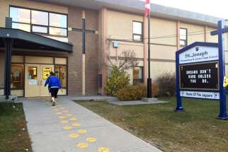 Entrance of St. Joseph Elementary Junior High School in Calgary 2015. A former principal from 2015-2017 of the school has filed has filed two human rights complaints charging that the school district refused her employment on the grounds of marital status, religious beliefs, and sexual orientation.