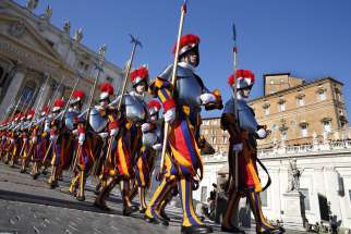 Swiss Guards march in St. Peter&#039;s Square at the Vatican. To better protect minors and vulnerable adults from all forms of abuse and exploitation, Pope Francis approved a new law and a set of safeguarding guidelines for Vatican City State and the Roman Curia.