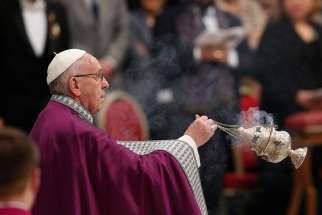Pope Francis uses incense during a Lenten penance service in St. Peter&#039;s Basilica at the Vatican March 17.