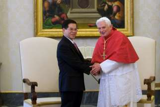 In a 2009 file photo, Vietnamese President Nguyen Minh Triet and Pope Benedict XVI are pictured during a private meeting at the Vatican. Delegations from the Vatican and from Vietnam reported continued progress in discussions between their two countries, a Vatican press statement said.