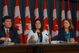 Government House Leader Dominic LeBlanc, Justice Minister Jody Wilson-Raybould and Health Minister Jane Philpott at a news conference on Parliament Hill April 14 after the tabling of Bill C-14 legalizing euthanasia and assisted suicide.
