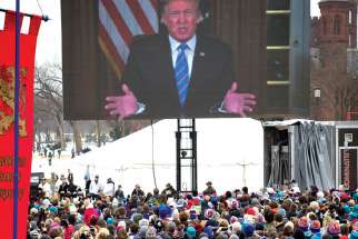 A videotaped message from President Donald Trump is broadcast during the annual March for Life rally in Washington Jan. 18. 