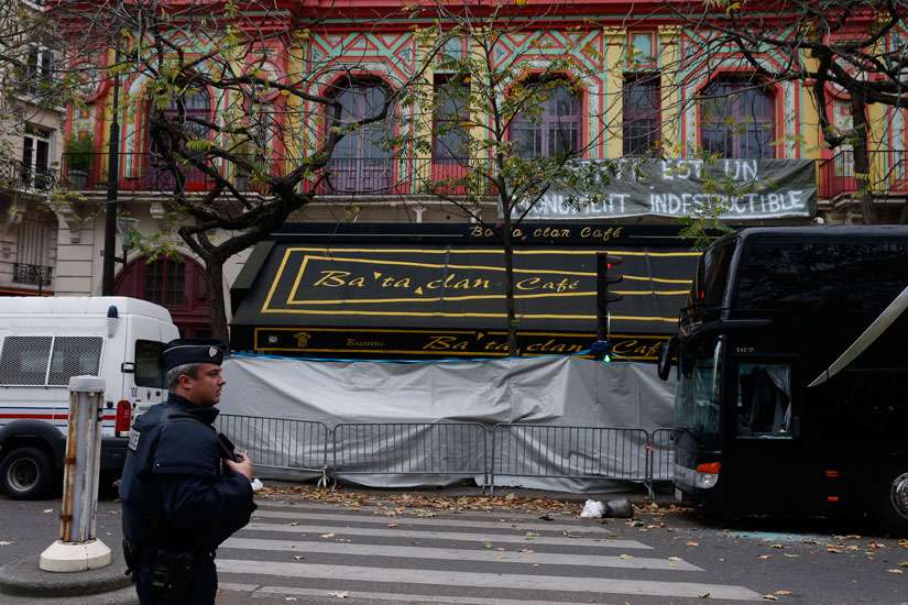 A policeman stands guard outside the Bataclan music hall in Paris Nov. 16. The Islamic State claimed responsibility for a Nov. 13 attack on the hall. 