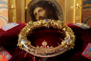 A reliquary containing what tradition holds is Jesus&#039; crown of thorns is displayed during a ceremony at Notre Dame Cathedral in Paris March 21, 2014. A major blaze engulfed the iconic cathedral April 15, 2019, sending pillars of flame and billowing smoke over the center of the French capital. 