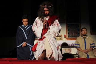 Fourteen-year-old Owen Cacayurin plays Jesus in this year’s reenactment of the Stations of the Cross at St. Paschal Baylon Church.