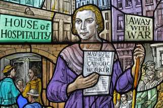Dorothy Day, co-founder of the Catholic Worker movement and its newspaper, &#039;The Catholic Worker,&#039; is depicted in a stained-glass window at Our Lady of Lourdes Church in the Staten Island borough of New York.