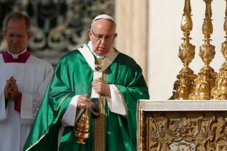 Pope Francis uses incense as he celebrates a jubilee Mass in honor of Mary in St. Peter&#039;s Square at the Vatican Oct. 9.