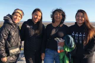 Juno Award winner Susan Aglukark, left, founder of the Arctic Rose Foundation, at a workshop in Ariat, Nunavut, that trains two Indigenous youth to serve as Community Artist Liason and Mentor (CALM) workers.
