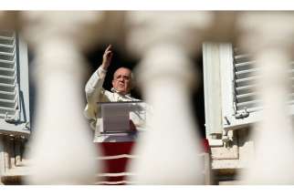 Pope Francis delivers his blessing as he leads the Angelus from his studio overlooking St. Peter&#039;s Square at the Vatican Dec. 8, the feast of the Immaculate Conception. 