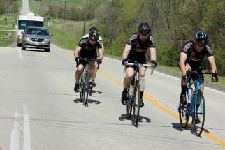 The first leg of Priests Pedaling for Prayers took Father Michael Pica, Father Tom Otto and Father Adam Cesarek about 70 miles (113 km) over several major hills in central Illinois April 24. Support vehicles driven by parents Don Otto and Jim and Sandy Cesarek made certain the young priests and their friends were safe on the road during their five-day trek to promote religious vocations.