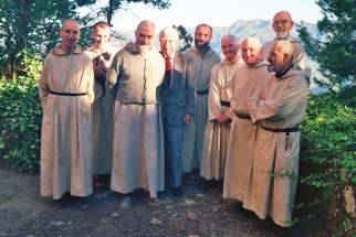 Trappist monks and a guest are pictured at the Monastery of Notre Dame de l&#039;Atlas near Medea, Algeria, in this undated photo. Seven Trappist monks of the monastery were murdered in 1996 by the members of the Armed Islamic Group. They will be beatified Dec. 8 in Oran, Algeria.