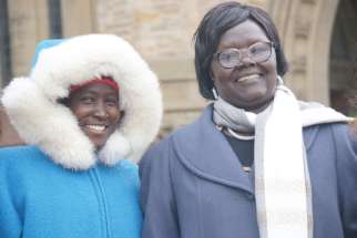 Awak Hussein Deng, youth coordinator for the South Sudan Council of Churches, and Agnes Wasuk Petia, coordinator of the Council’s National Women’s Program, on Parliament Hill Dec. 7