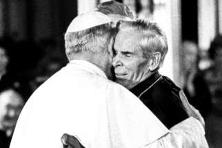 Then-Pope John Paul II is seen in an undated photo embracing Archbishop Fulton J. Sheen. Archbishop Sheen, the famed media evangelist, mission promoter and author, who will be beatified Dec. 21, 2019, at St. Mary&#039;s Cathedral in Peoria, Ill.