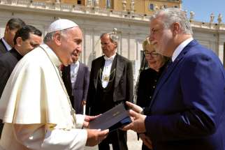 Pope Francis accepts an official invitation to visit Montreal from Quebec Premier Philippe Couillard during his general audience in St. Peter’s Square at the Vatican May 27. The Pope was invited to visit Montreal in 2017 for the city’s 375th anniversary.