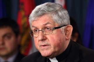 Cardinal Thomas Collins of Toronto speaks out against euthanasia and physician-assisted suicide during an April 19 news conference on Parliament Hill in Ottawa, Ontario. The Cardinal released a statement on June 20 responding to the passing of Bill C-14