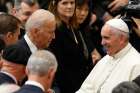 U.S. Vice President Joe Biden meets Pope Francis after both leaders spoke at a conference on adult stem cell research at the Vatican April 29.