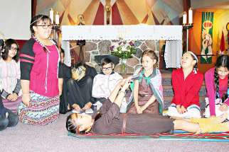 Young people from Our Lady of Seven Sorrows Parish in Maskwacis, Alberta, perform a play based on the life of St. Kateri Tekakwitha. It was part of a July 14 Mass and celebration honoring North America&#039;s first indigenous saint. 