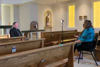 Archbishop J. Michael Miller is interviewed by Tina House of APTN News.