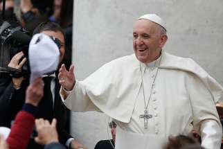  Pope Francis greets the crowd during his general audience in St. Peter&#039;s Square at the Vatican April 11.