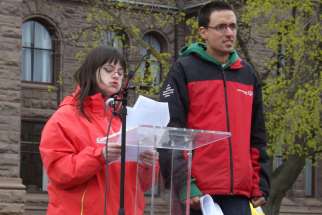 Christina Lee Fast tells the hundreds gathered at the first Toronto March for Life May 9 that her life as a woman with Down Syndrome is worth living and so are the four million lives that have been aborted in Canada since 1969. With Fast is her boyfriend, Matthew Gregory. 
