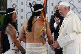 Pope Francis greets people of the Amazon in Puerto Maldonado, Peru, Jan. 19. Pope Francis has chosen the theme, &quot;The Amazon: New paths for the church and for integral ecology,&quot; for the Synod of Bishops for the Amazon region. The synod will be held at the Vatican in October 2019. 