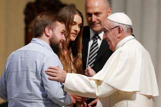 Pope Francis greets a recently married couple as he visits St. Mary&#039;s Pro-Cathedral in Dublin Aug. 25. 