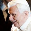 Pope Benedict XVI is pictured while greeting guests during his general audience in Paul VI hall at the Vatican Jan. 4. 
