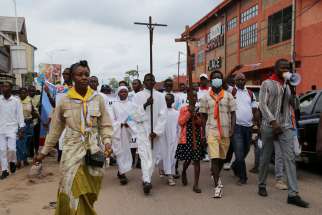 Demonstrators march during a protest by the Democratic Republic of Congo&#039;s Catholic and Protestant churches, against escalating violence in Kinshasa Dec. 4, 2022. Deadly violence hit Christians in Africa Jan. 15, 2023, with a Catholic priest in northern Nigeria burned to death and as many as 17 Christians killed in a blast in eastern DRC. 