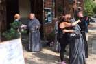 Conventual Franciscan friars greet the residents of the Greenpoint/Williamsburg section of Brooklyn, N.Y., Aug. 23, 2015, shortly after they opened their San Damiano Mission in the neighborhood, which had been the Holy Family (Slovak) Church.