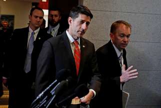 U.S. House Speaker Paul Ryan, R-Wis., and Mick Mulvaney, Office of Management and Budget director, arrive for a March 23 meeting about the American Health Care Act on Capitol Hill in Washington.