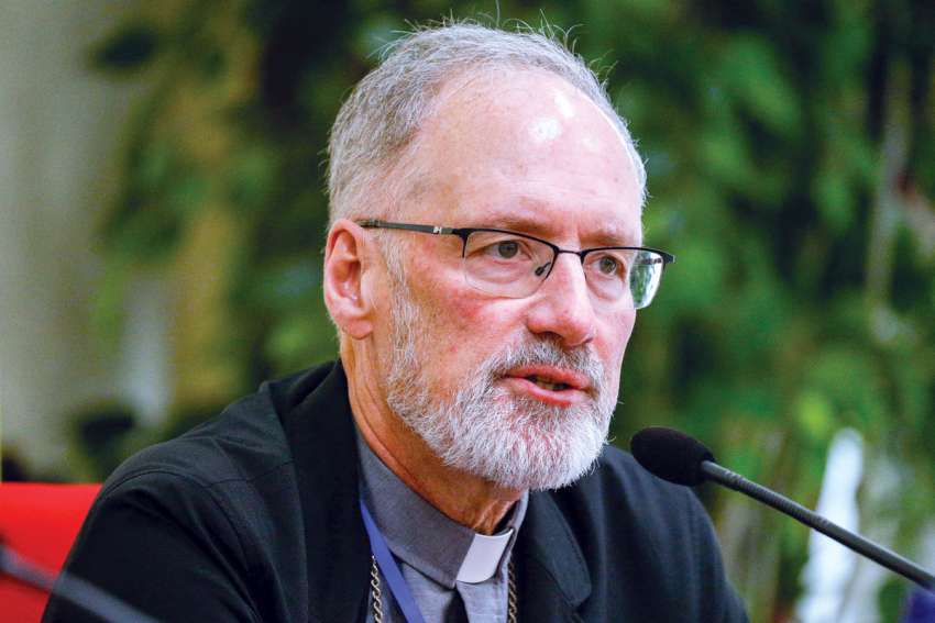 Archbishop Paul-André Durocher of Gatineau, Que., speaks during a news conference at the end of the 2023 International Safeguarding Conference at the Pontifical Gregorian University in Rome.