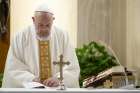 Pope Francis celebrates Mass April 17, 2020, in the chapel of his Vatican residence, the Domus Sanctae Marthae.
