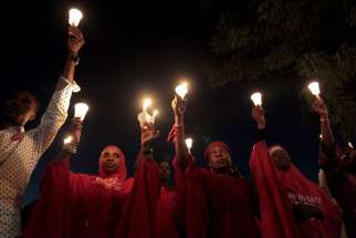 #BringBackOurGirls campaigners in Abuja raise candles during a gathering Aug. 27, to mark the 500th day that more than 200 girls of the Government Secondary School were abducted by Boko Haram in their dormitory in Chibok, Nigeria.