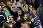 Young Muslims protest Republican presidential candidate Donald Trump before being escorted out during a campaign rally in the Kansas Republican Caucus at the Century II Convention and Entertainment Center in Wichita, Kan., on March 5, 2016. 