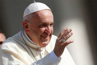  Pope Francis greets the crowd during his general audience in St. Peter&#039;s Square at the Vatican April 25. 