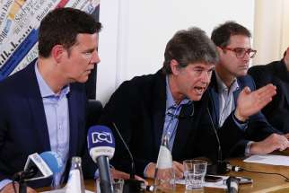 Chilean clerical sex abuse survivors Juan Carlos Cruz, James Hamilton and Jose Andres Murillo attend a news conference at the Foreign Press Association building in Rome May 2. 